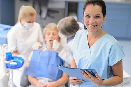 smiling staff at dental office
